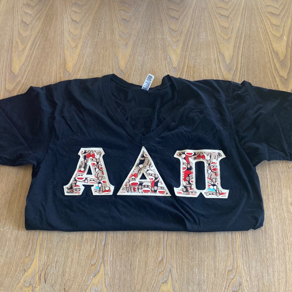 ADPI lettered shirt